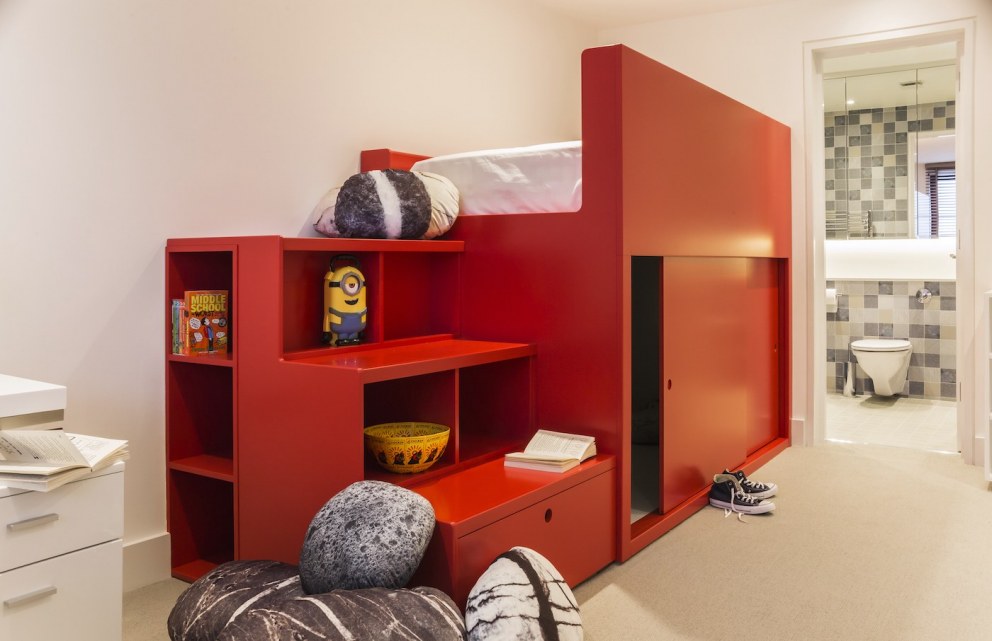 3000 sqft Townhouse - Highgate | Bespoke Red Lacquer Bed with cubby / hiding place below  | Interior Designers